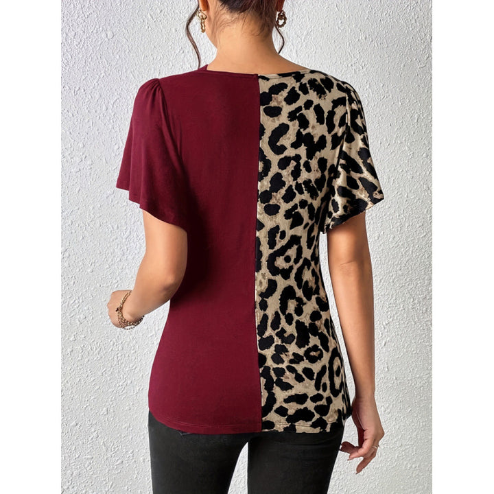 Dame Trendy top med asymmetrisk design og raffinerede cut-outs Skovae