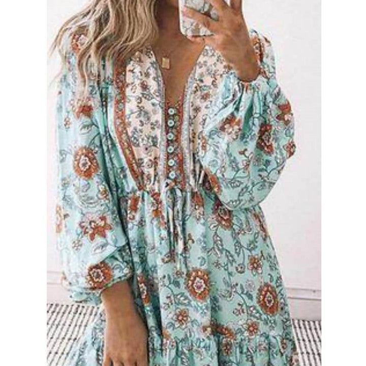 Dame Boho-inspireret fritidskjole med ballonærmer og knapdetalje Stilla