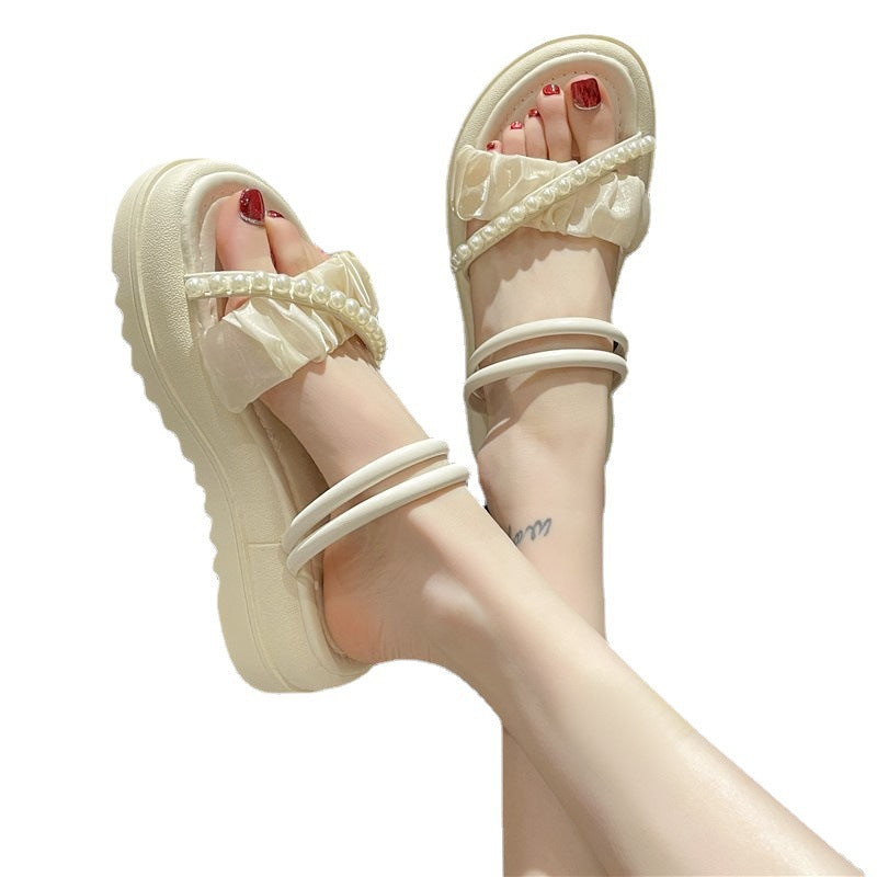 Dame sandaler med raffineret flæsedesign og elegante perledetaljer Stilla