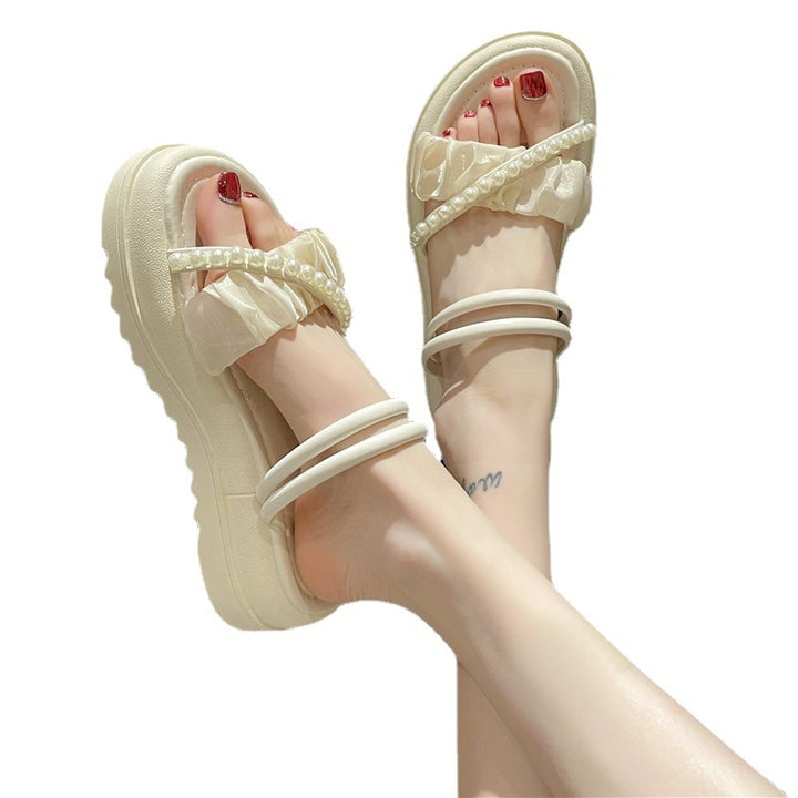 Dame sandaler med raffineret flæsedesign og elegante perledetaljer Stilla