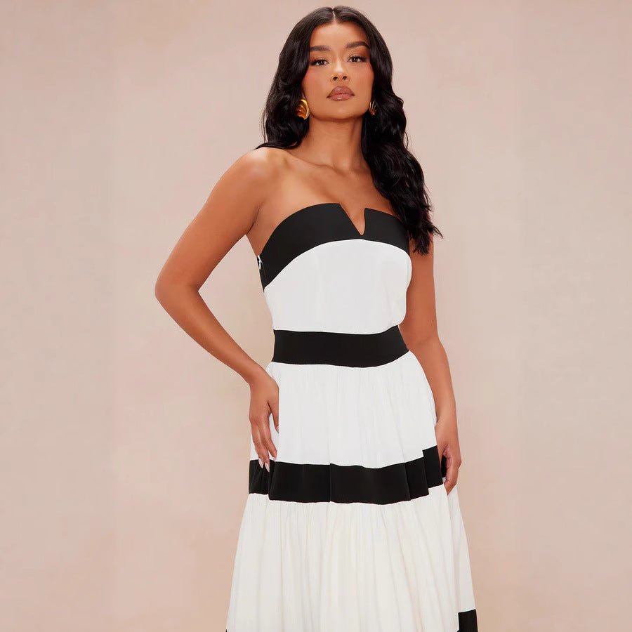 Dame maxikjole med off-shoulder design og vid skirt Skovae