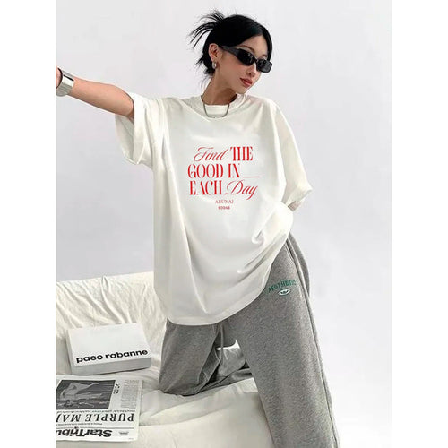Dame Relaxed-Fit T-shirt med inspirerende statementtryk og moderne snit Stilla