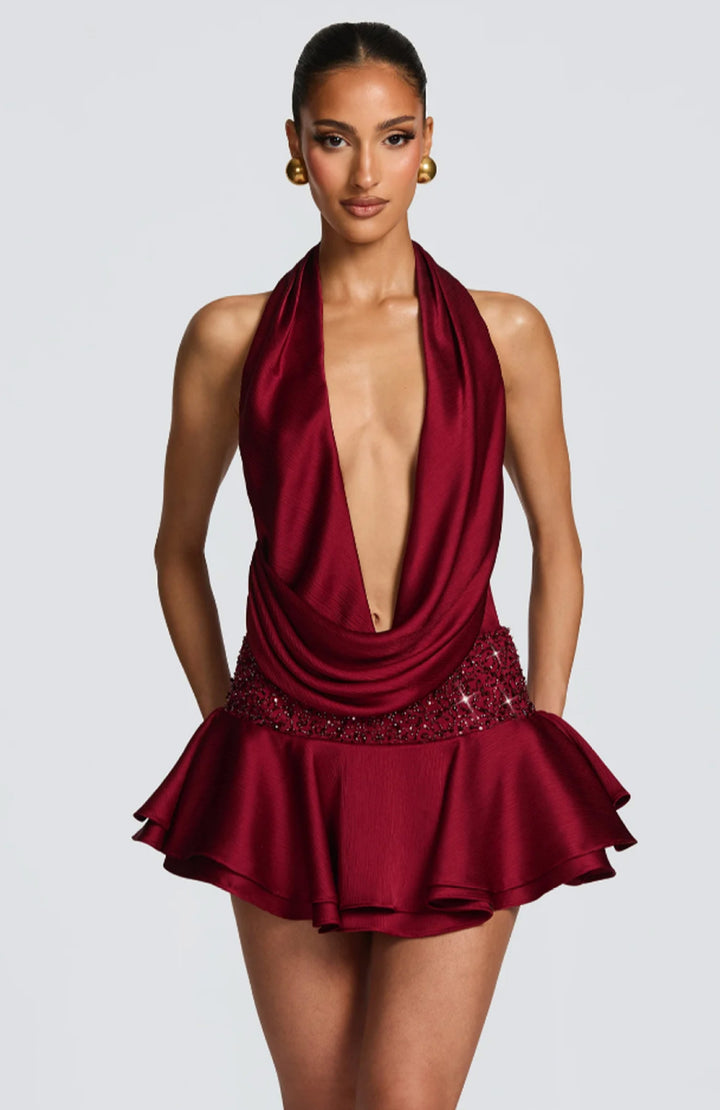 Kvinders elegante omslagskjole med dyb V-hals og flagrende skirt