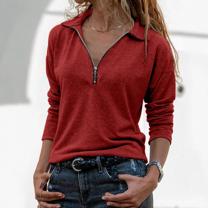 Dame sporty sweatshirt med moderne ståkrave og half-zip-design Stilla