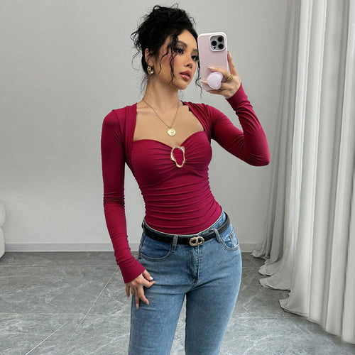 Damer figure-hugging bodysuit med elegant hjerteudskæring og draperingsdetaljer Stilla