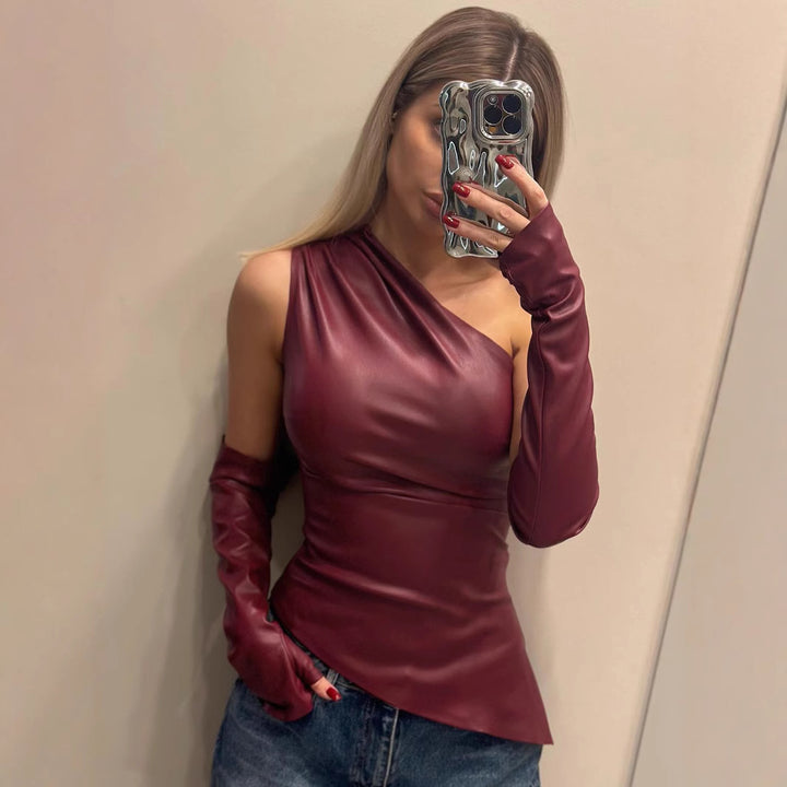 Dame Elegant top med asymmetrisk design og lange armeafslutninger Skovae