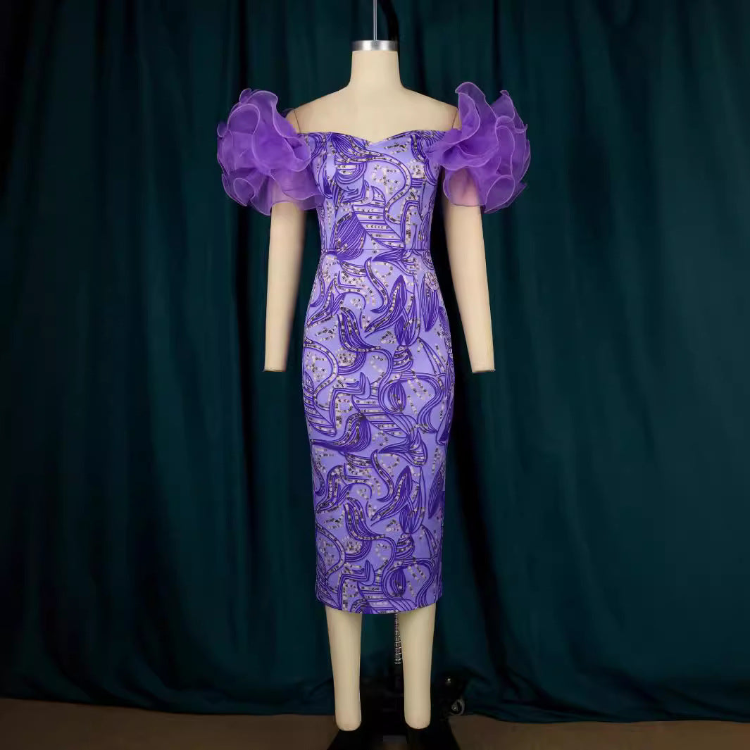 Dame Elegante Midi-Kjole med innovative puffærmer og kunstnerisk tryk Skovae