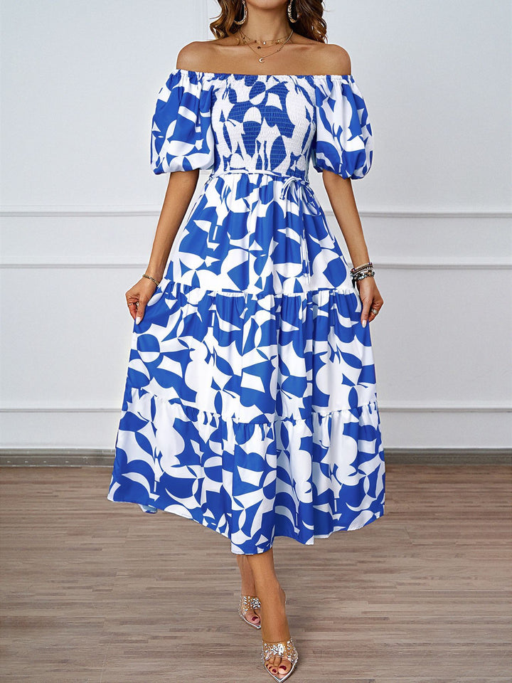 Dame sommerkjole med elegant puffærme-design og floralt mønster Stilla