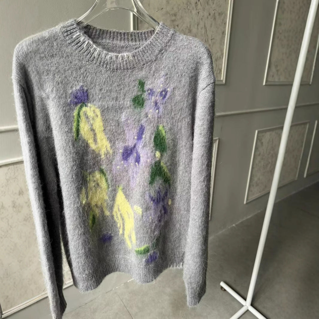 Dame strikpullover med blomsterdesign og blød tekstur Stilla