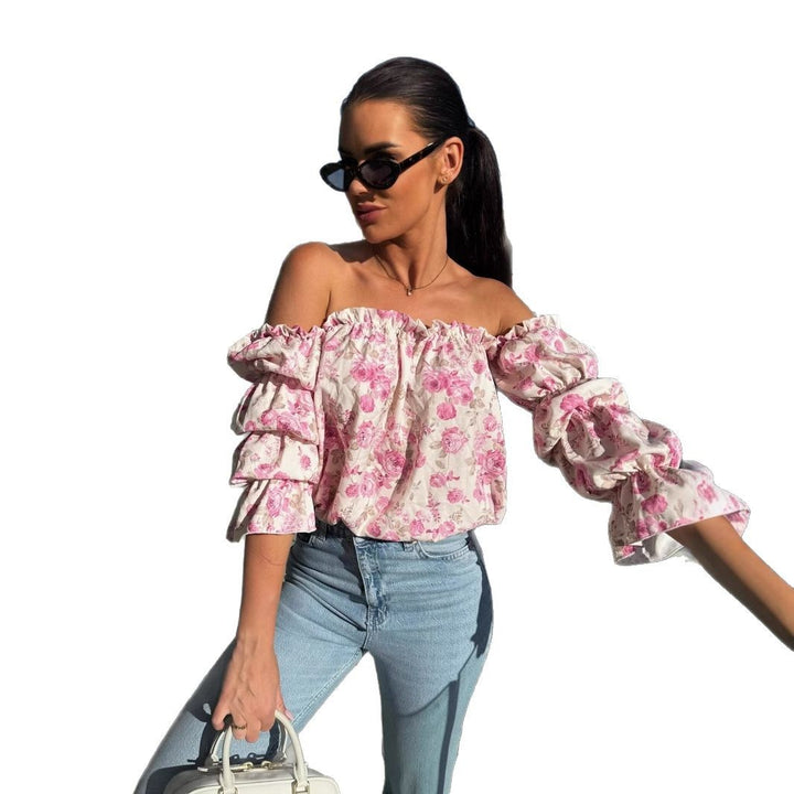 Dame Off-Shoulder-bluse med volumniøse ærmer og blomsterdesign Stilla