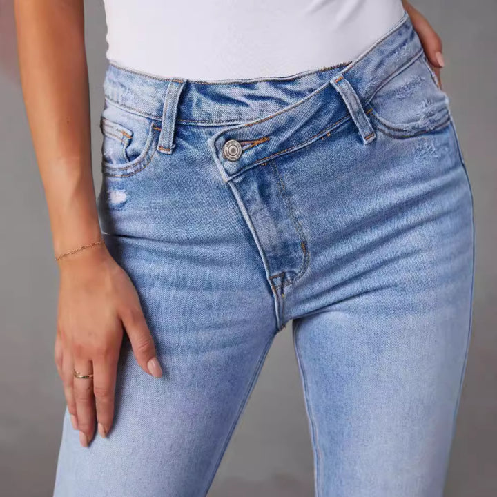 Dame Bootcut Jeans med frynset kanter og modepræget karakter Stilla