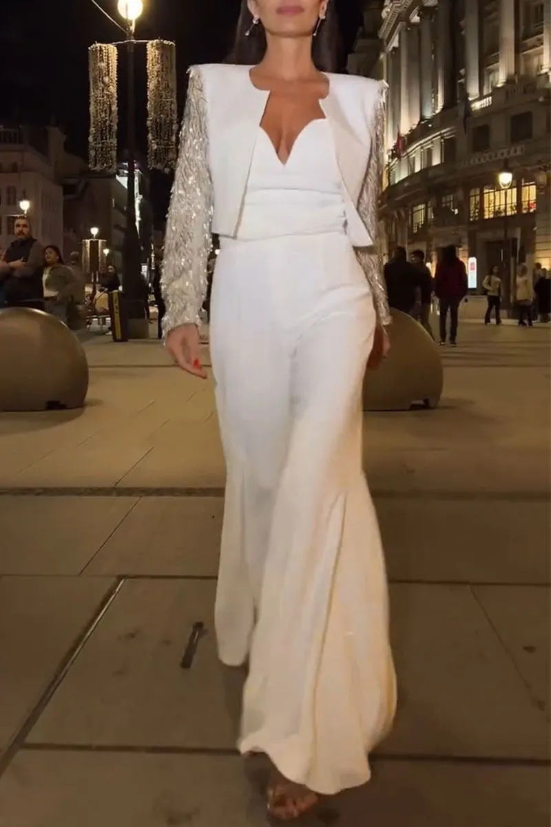 Dame Elegant jumpsuit med raffineret V-udskæring og svingende ben Stilla