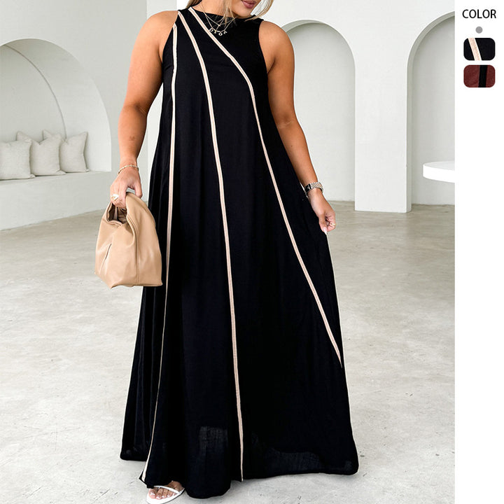 Dame maxi kjole med asymmetrisk design og elegante kontrastsyninger
