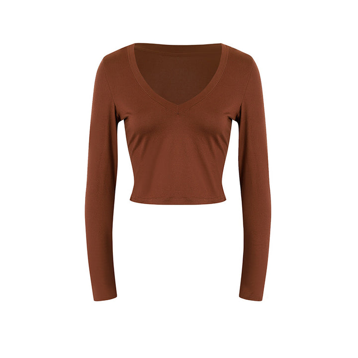 Dame cropped langærmet shirt med V-hals og elastisk materiale Skovae