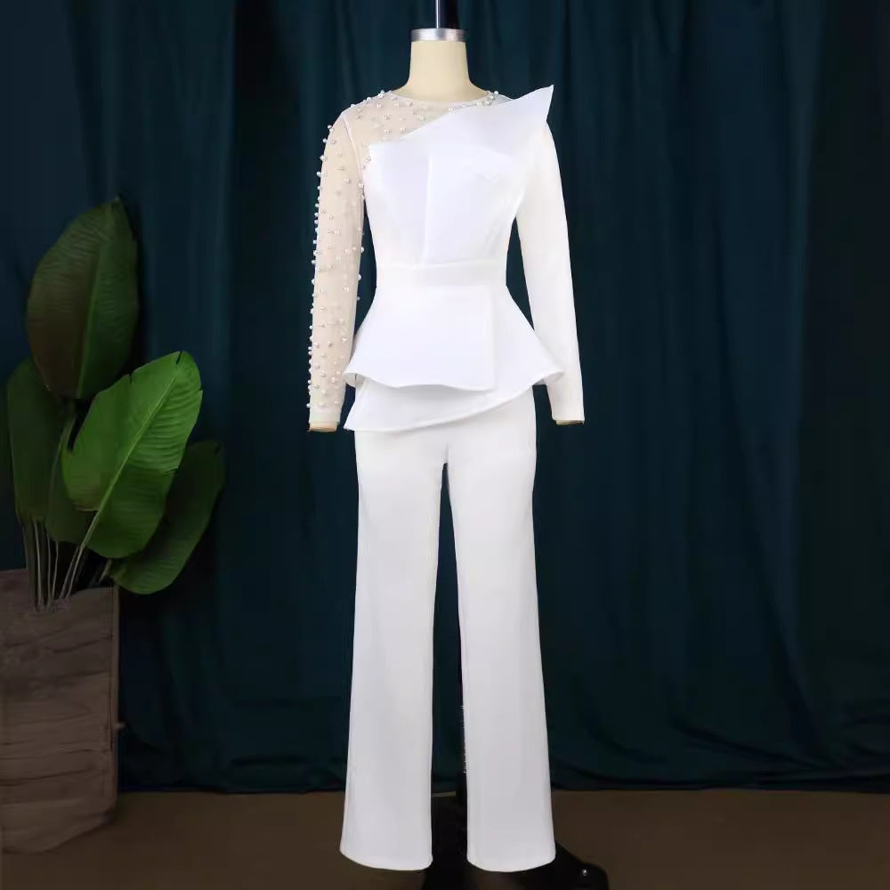 Dame elegant jumpsuit med asymmetrisk overdel og raffineret ruffles design Skovae