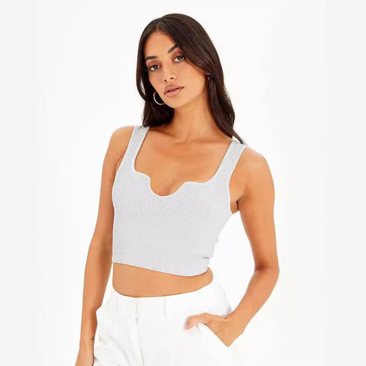 Dame Crop-top med bølget udskæring og fin ribstruktur Skovae
