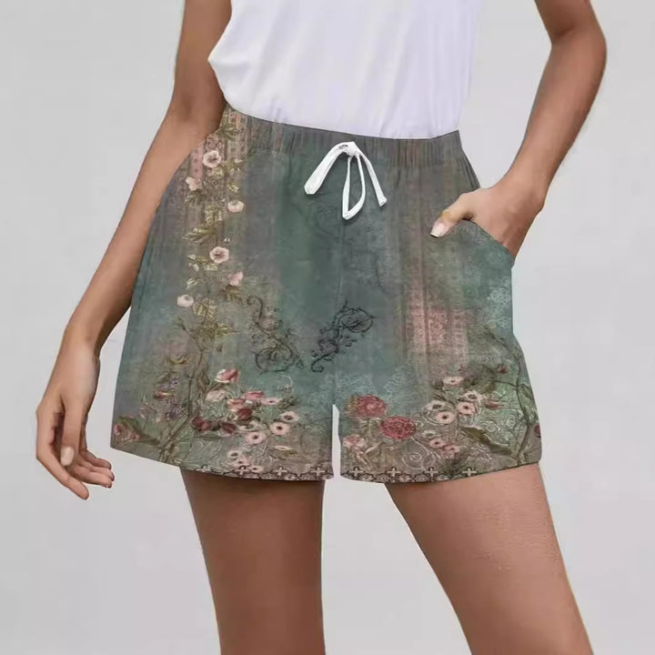 Dame shorts med blomsterprint og sidelommer Stilla