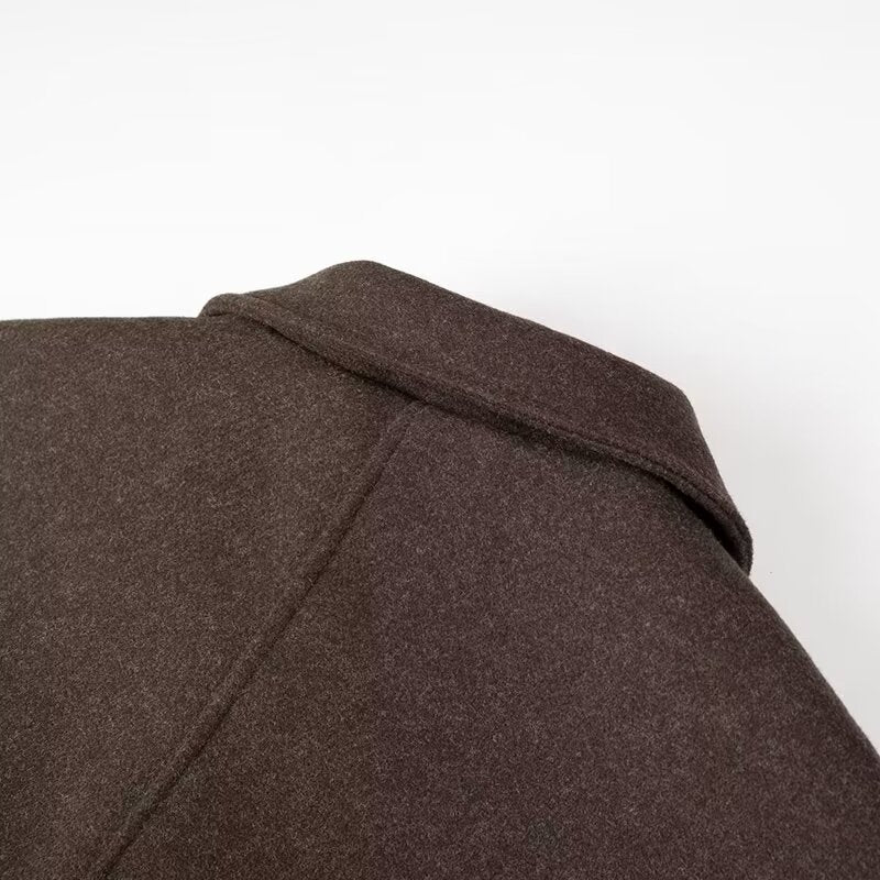 Dame oversized uldjakke med enkle knapper og praktiske lommer Stilla