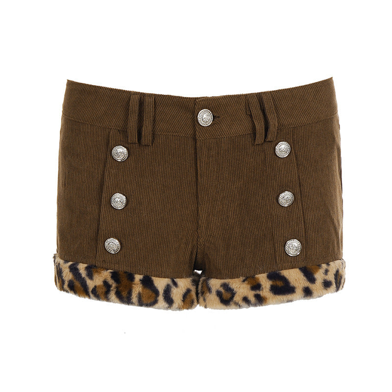 Dame shorts med elegante knapdetaljer og trendy leopardbesætning Skovae