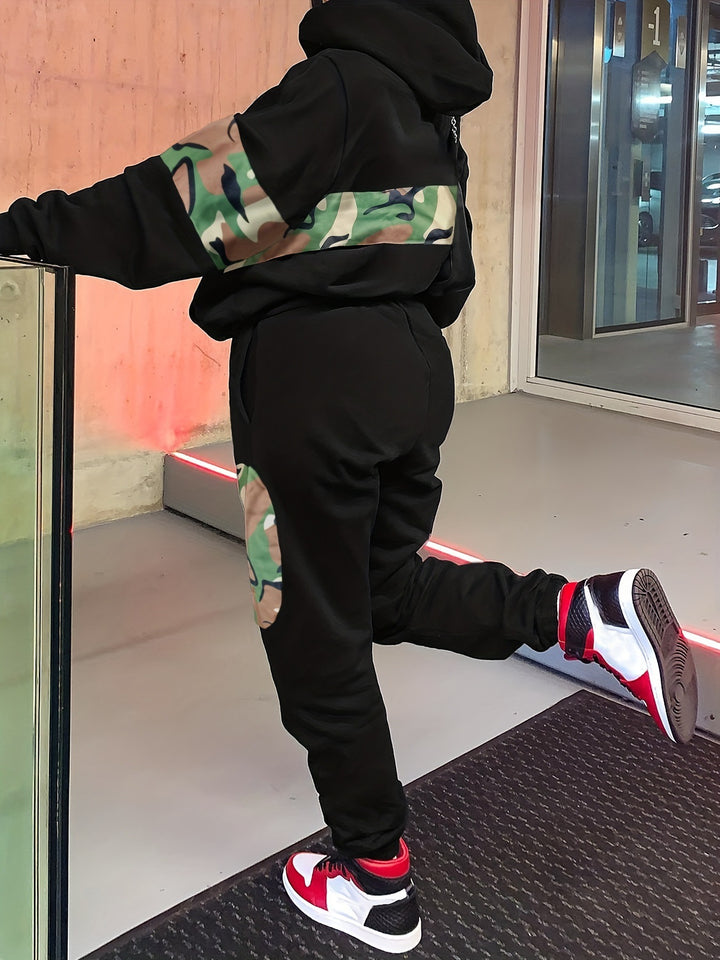 Dame sport joggingdragt med moderne camouflage-mønster og behagelig pasform Stilla