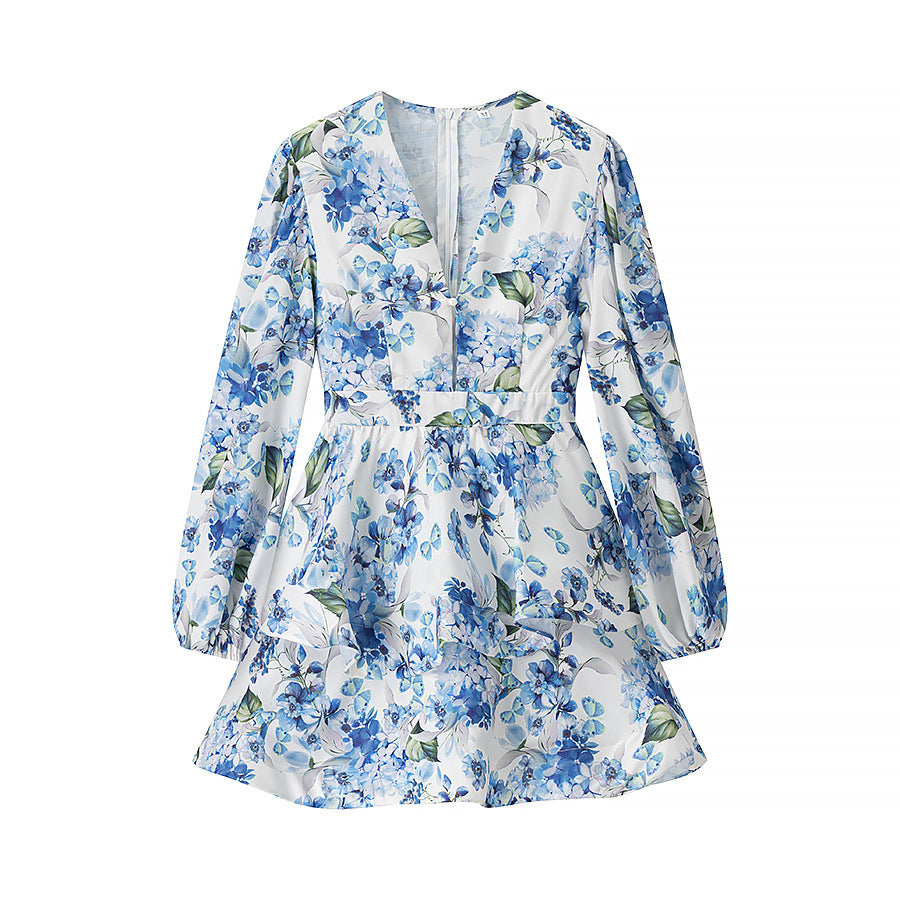 Dame minikjole med blomsterdesign og elegante flæsedetaljer Stilla