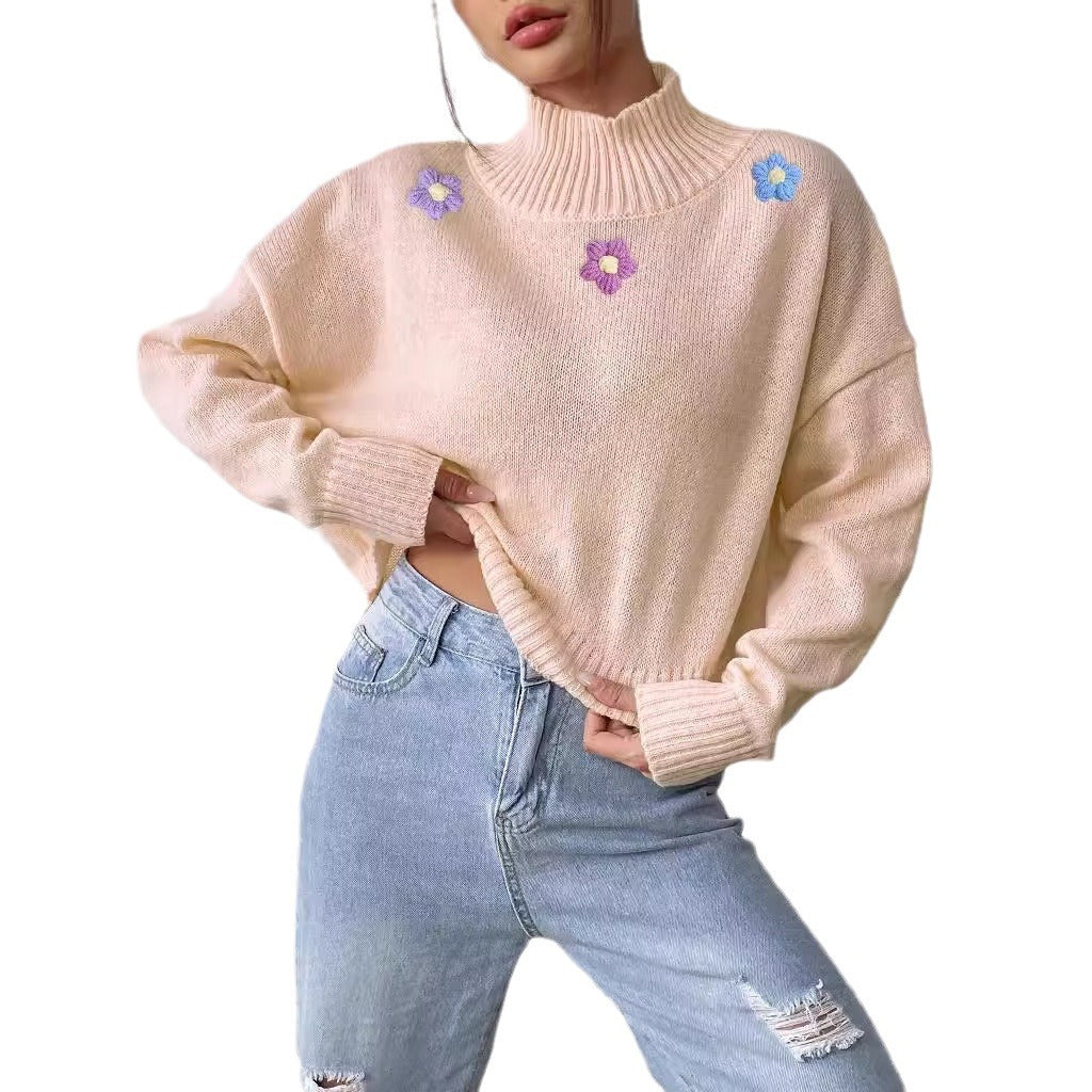Dame elegant strikpullover med blomstret design og høj krave Stilla