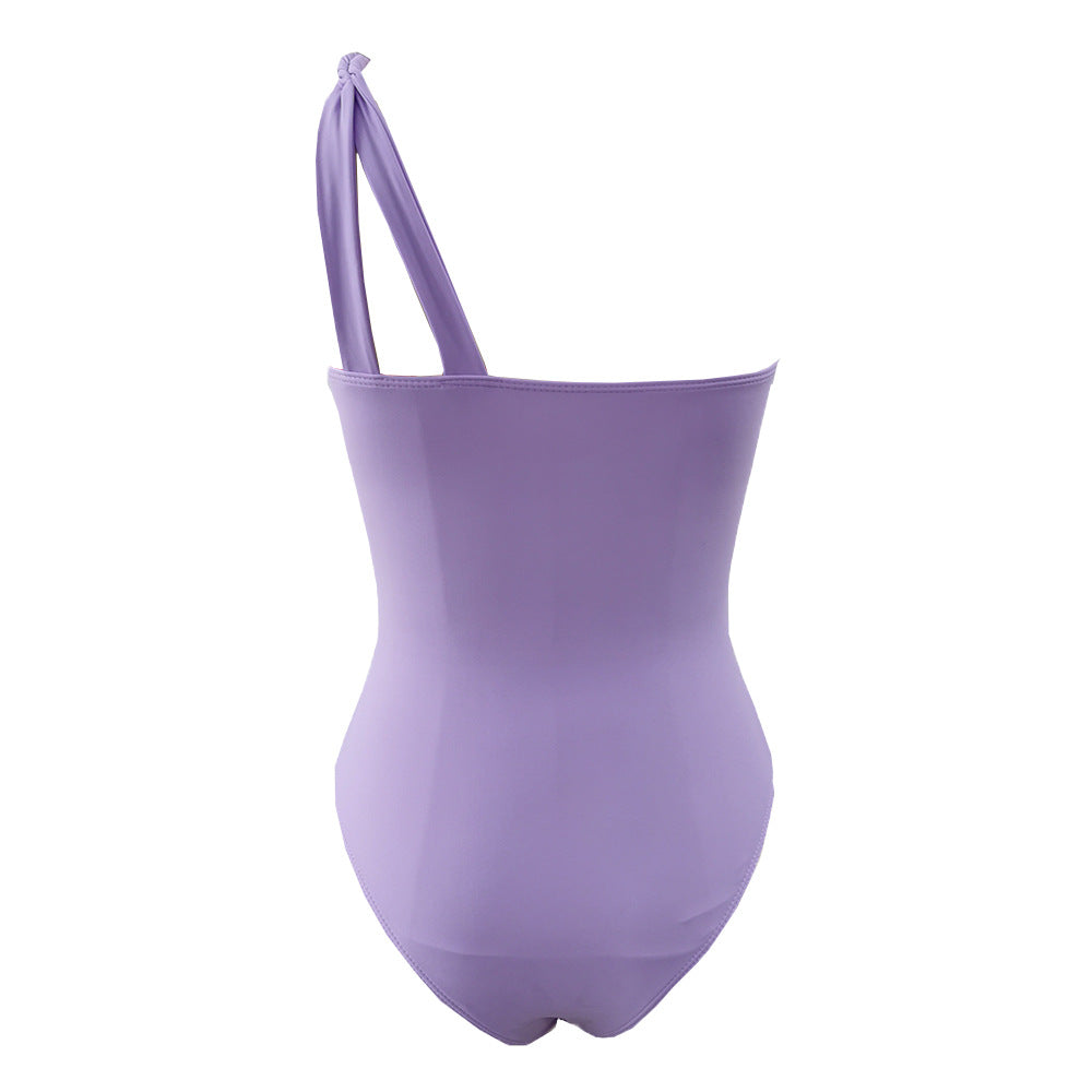 Dameheldragt badedragt med raffineret vikledesign og elegante udskæringer Stilla