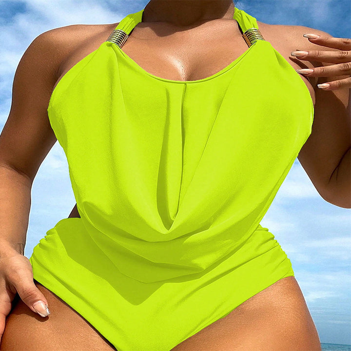Dame one-piece badesuit med raffineret drapering og gyldent accent Skovae
