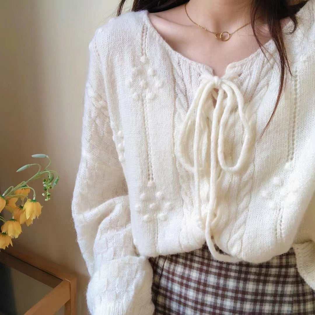 Dame trendy sweater med dekorative bånd og struktureret mønster Stilla