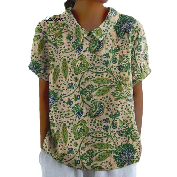 Dame kortærmet bluse med kunstnerisk blomsterprint Stilla