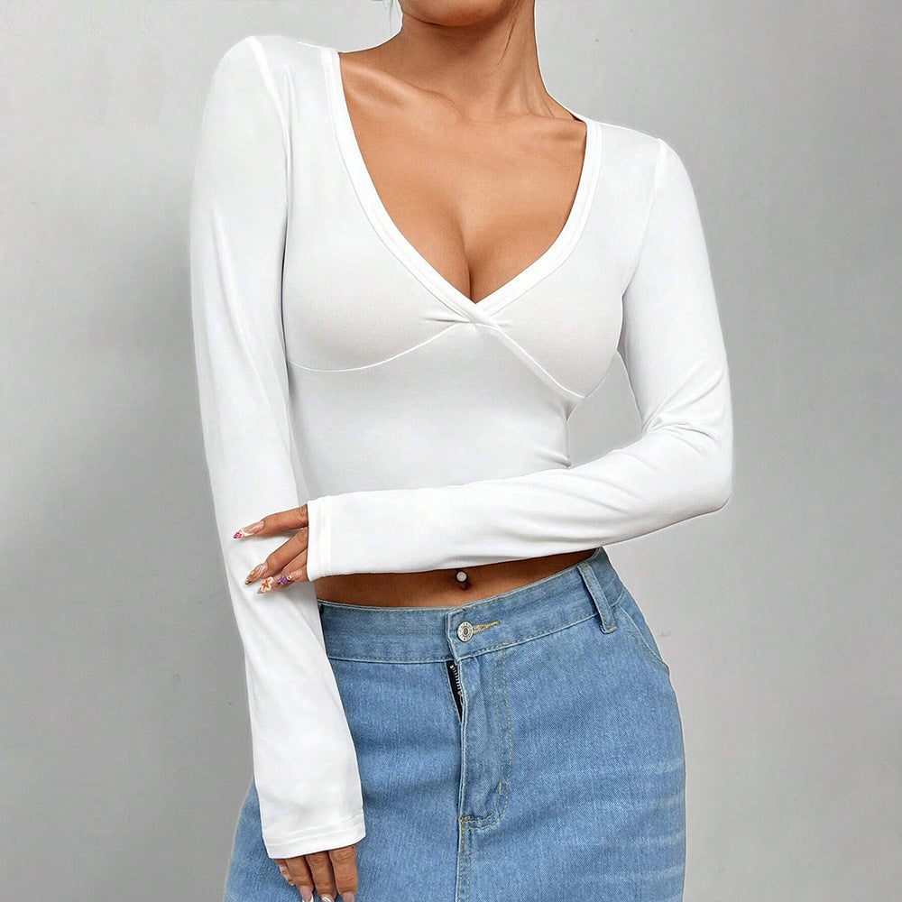 Kvindernes kortærmede crop top med dyb V-udskæring og elegant indpakningsdesign Stilla