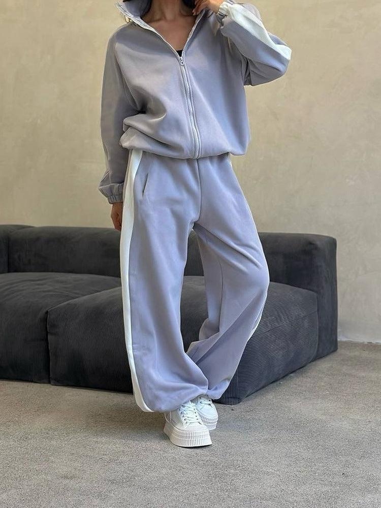 Dame sporty to-delt lavet af blød fleece med praktiske lommer og lynlås Skovae