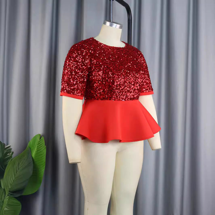 Damer elegant glitrende overdel med svajende peplum Skovae