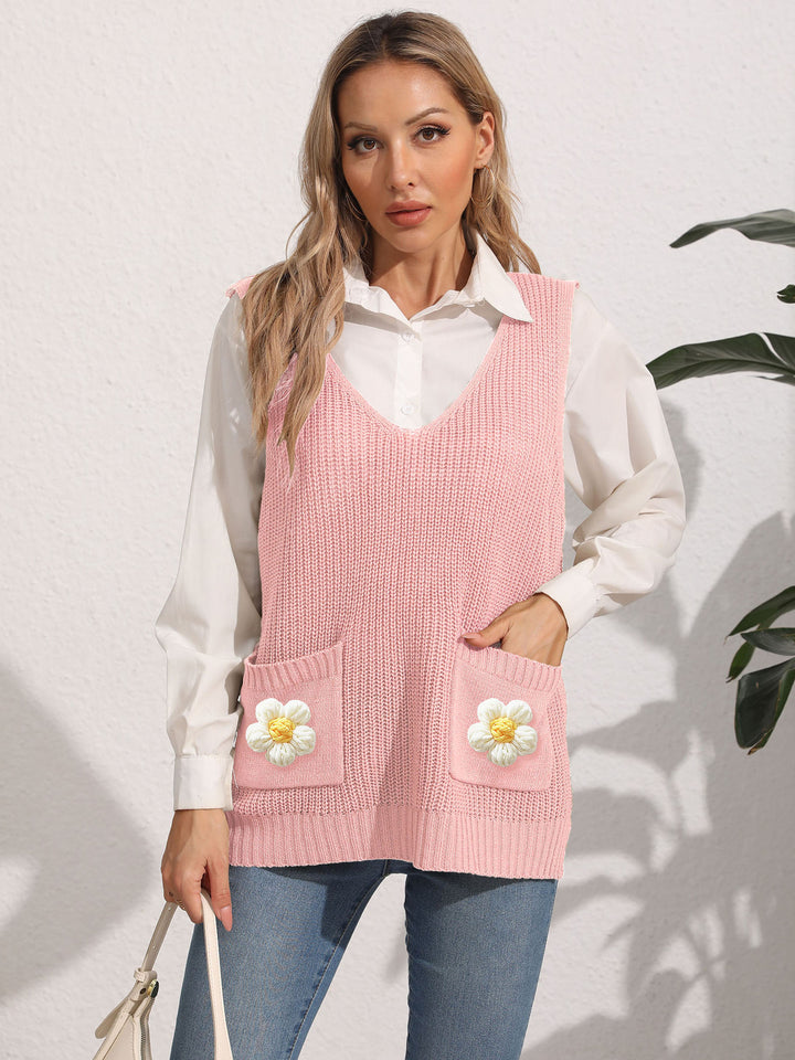 Dame strikvest med lommer og florale applikationer Stilla