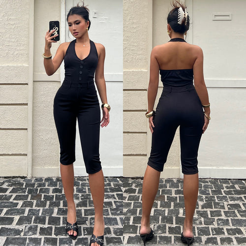 Dame jumpsuit med dyb V-udskæring og elegant knapdetalje Skovae