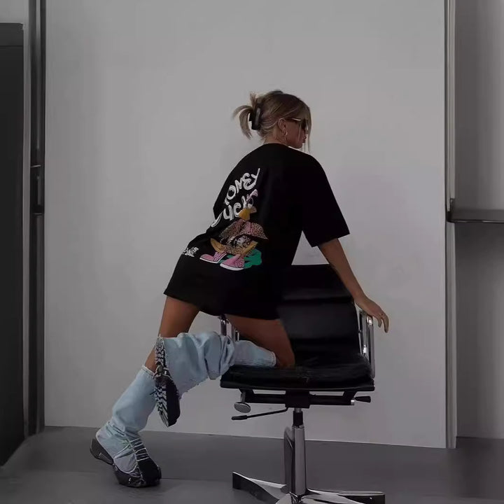 Dame T-shirt med kreativt cartoon-design og afslappet pasform Stilla