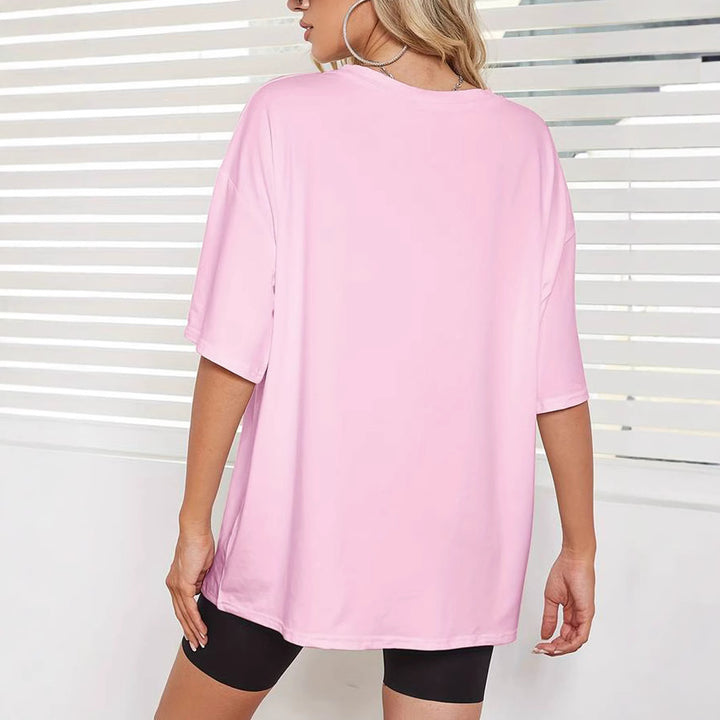 Dame Oversized T-Shirt med kreativt Beach Club design Stilla