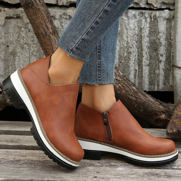 Dame Komfortable Clogs med elegant lynlås og skridsikker sål Stilla