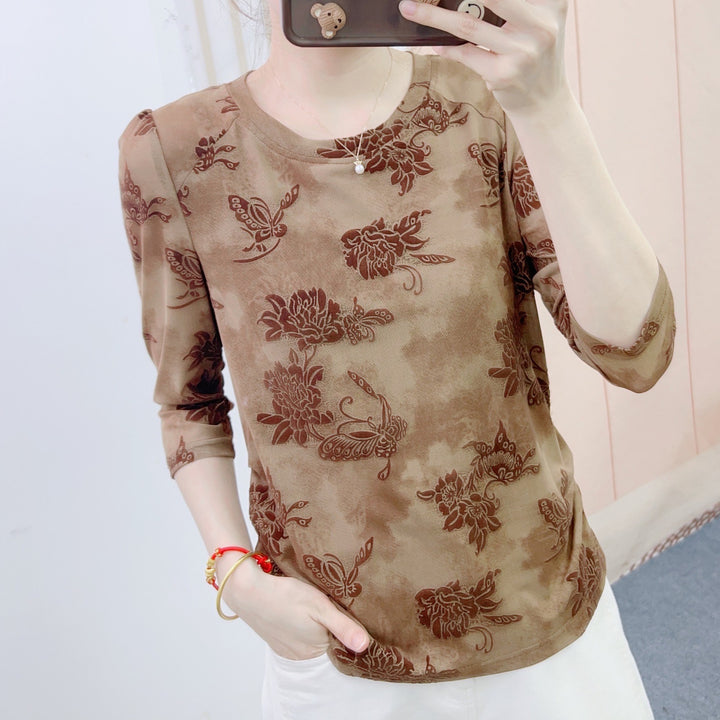 Dame mode blouse med 3/4-ærmer og blomster design Stilla