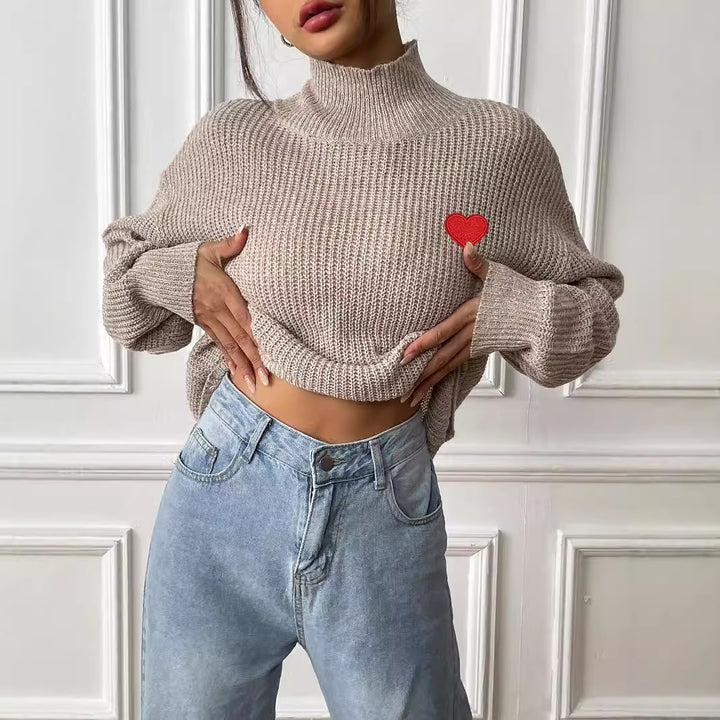 Dame rullekrave sweater med hjerteapplikation og løs pasform Stilla