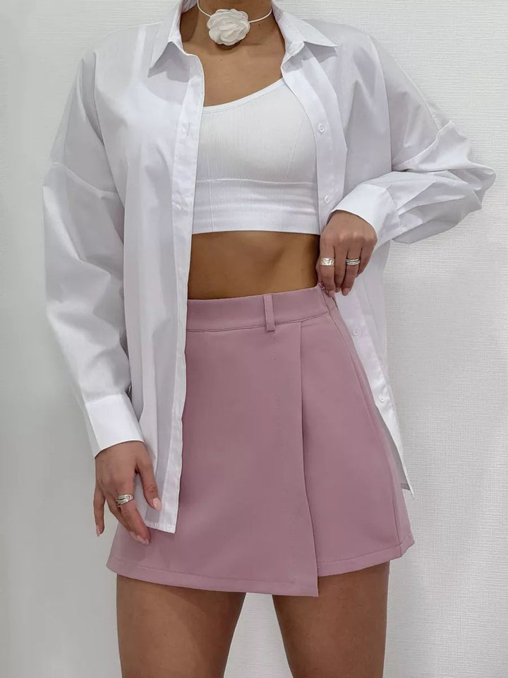 Dame cropped top med iøjnefaldende knudedesign og tætsiddende snit Stilla