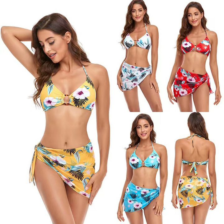 Dame bikini-sæt med moderigtige indpakningsskørt og elegante blomster motiver Stilla