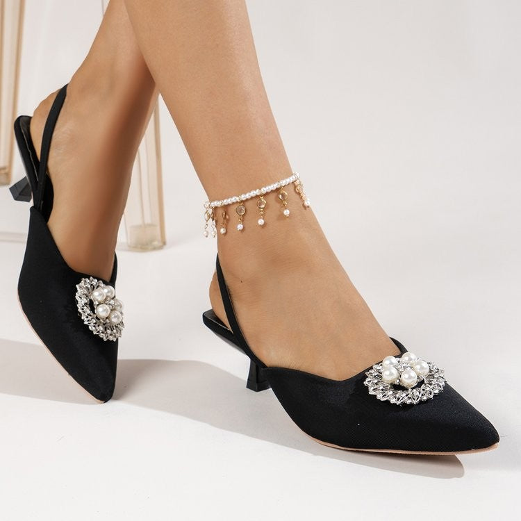 Dame Slingback-pumper med elegant perleapplikation og moderne snit Stilla