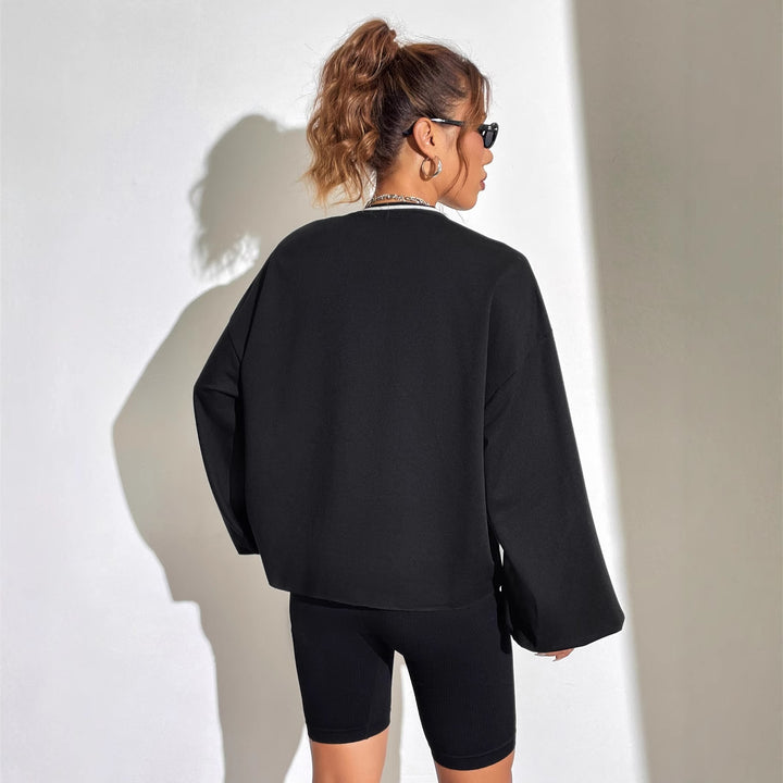 Kvinders afslappede oversized sweatshirt med V-hals og grafisk tryk Stilla