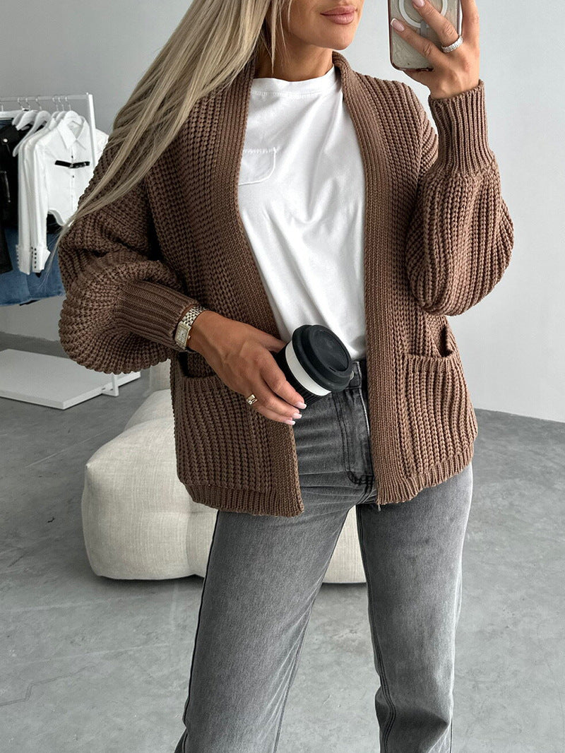 Kvindernes moderne cardigan med voluminøse ærmer og lommer Stilla