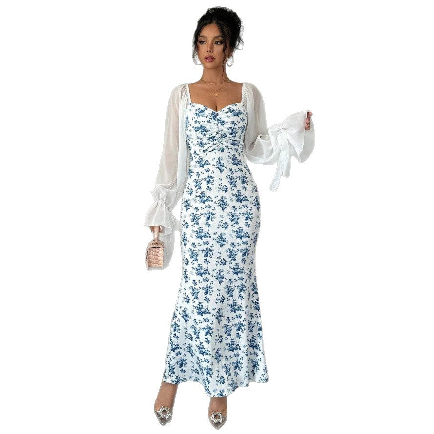 Dame maxikjole med blomsterprint og elegant chiffonoverdel Skovae