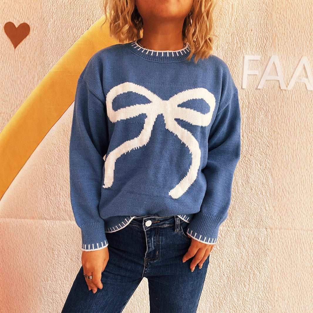 Dame sweater med legende designet sløjfe applikation og moderne snit Stilla