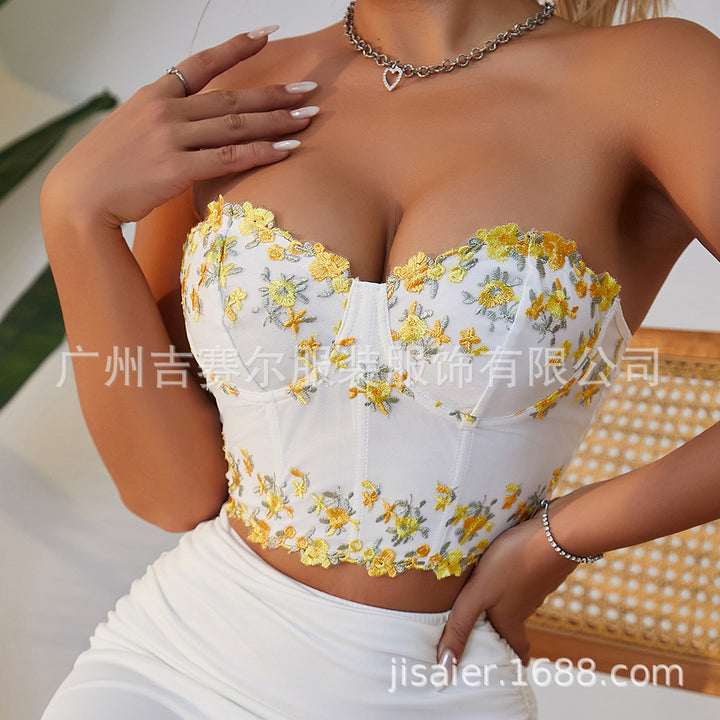 Dame Bustier-top med blomsterbroderier og raffinerede spidsafslutninger Stilla