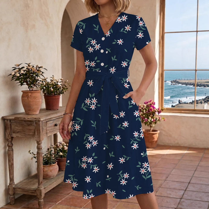 Dame midi kjole med blomsterprint og talje bælte Skovae