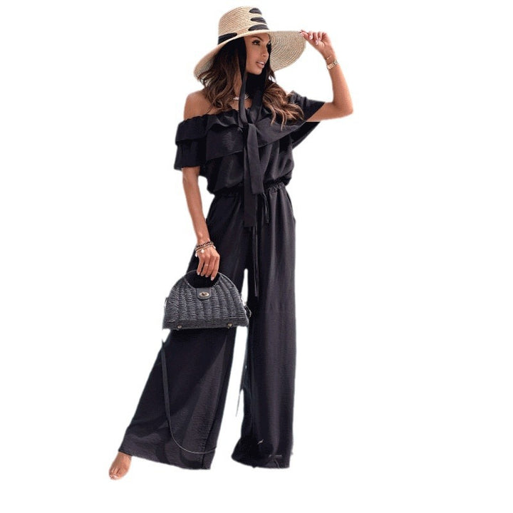 Dame elegant jumpsuit med off-shoulder udskæring og flydende snit Stilla